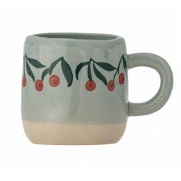 Tasse bleue avec cerise